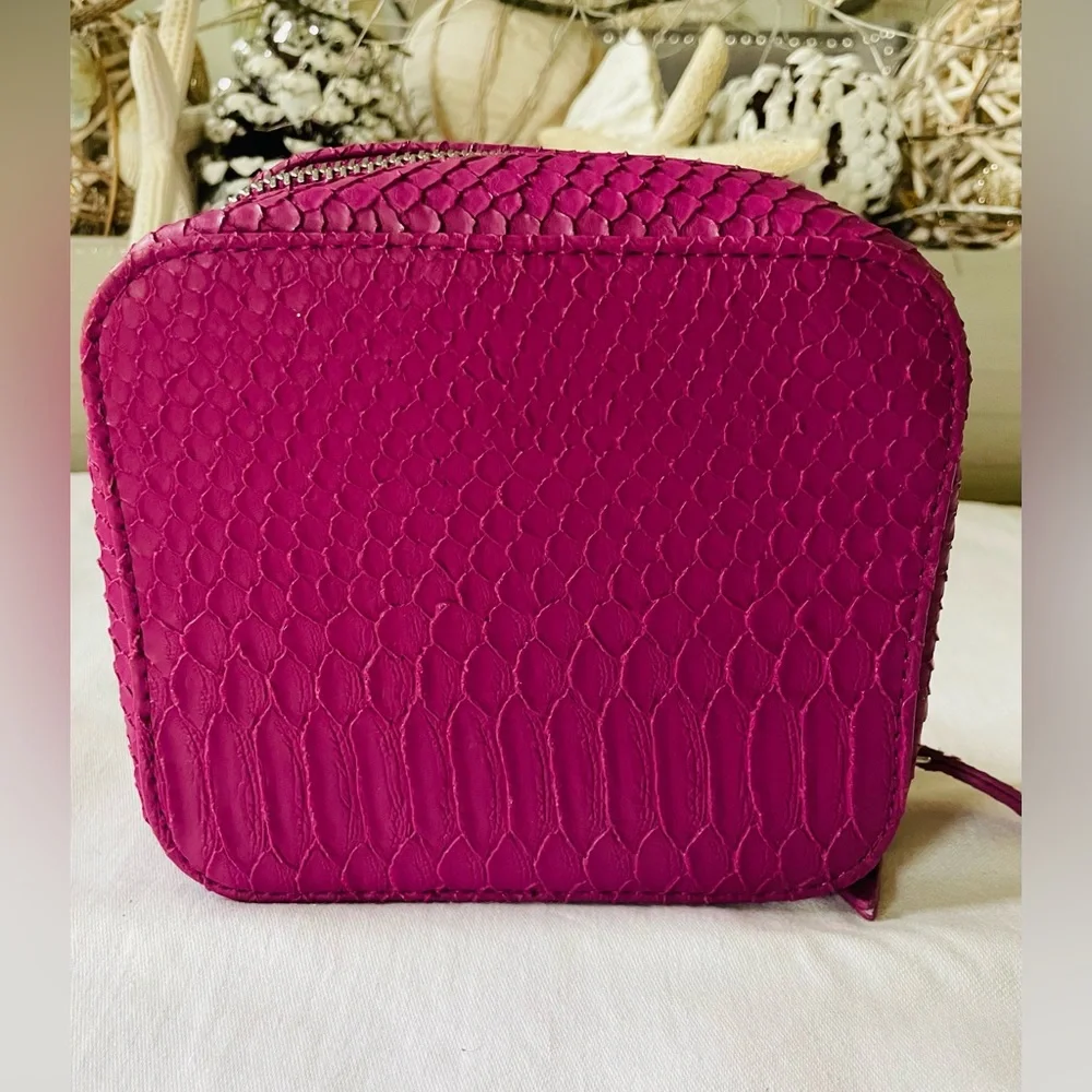 TRISH McEvoy embossed pink makeup planner